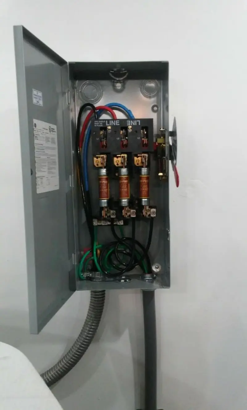 Three-phase disconnect switch installed for Smoke Detector Installation in Zebulon